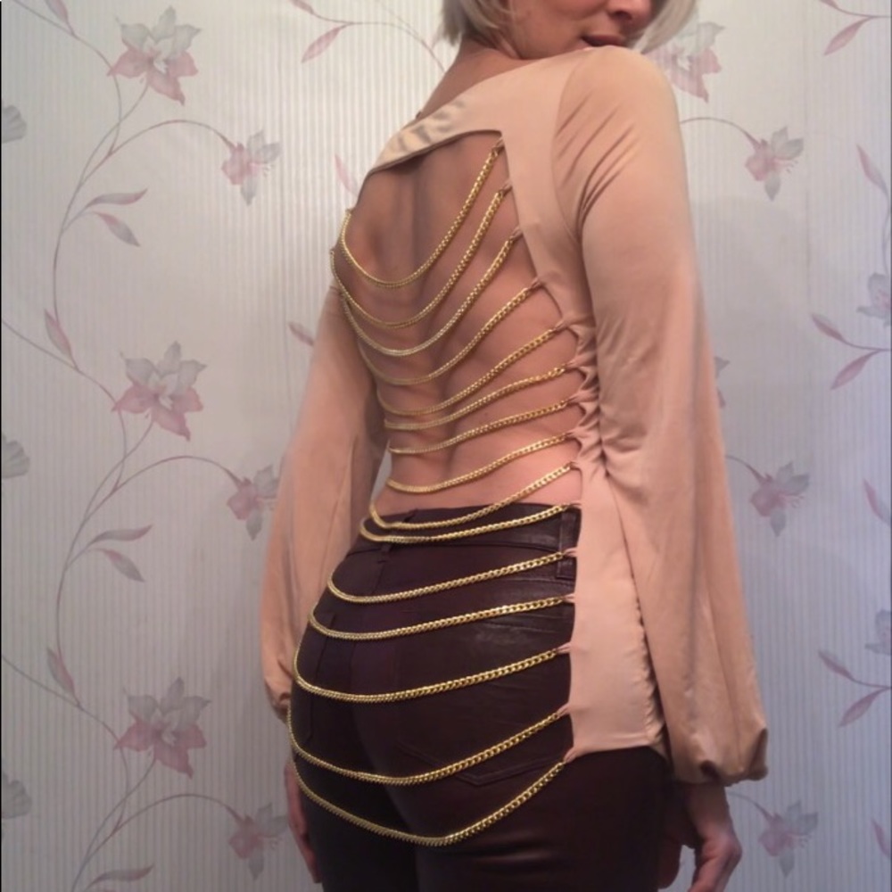 A one of a kind backless top by Savee